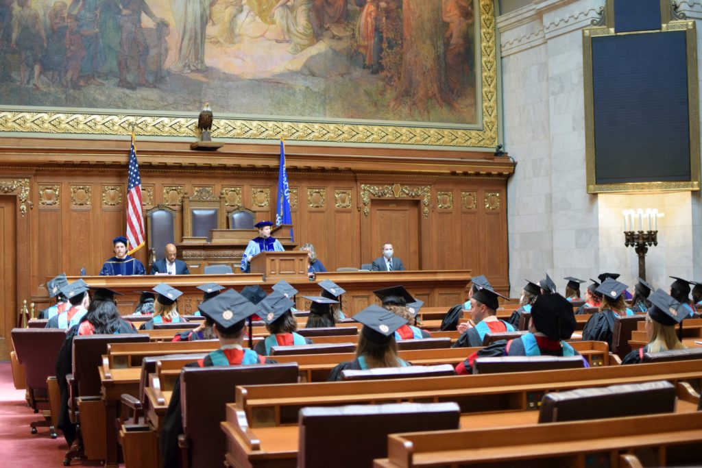La Follette School Director and Professor Susan Yackee addresses graduates at the 2022 graduation ceremony