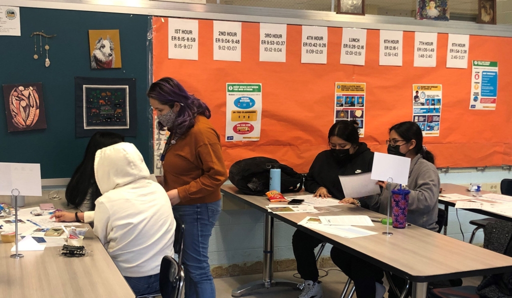 Photo of students engaging in a climate simulation.