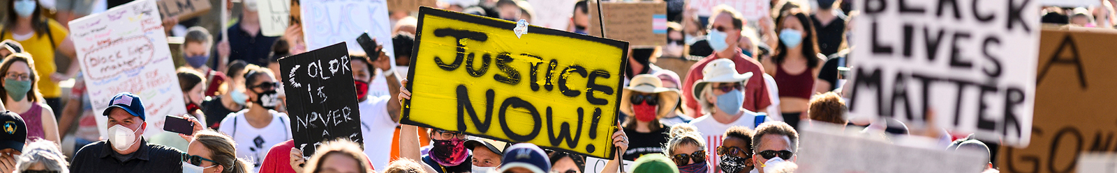 Thousands of demonstrators gather and speak out against racism and racial injustice as they walk through Library Mall at the University of Wisconsin-Madison for a Black Lives Matter Solidarity March on June 7, 2020.