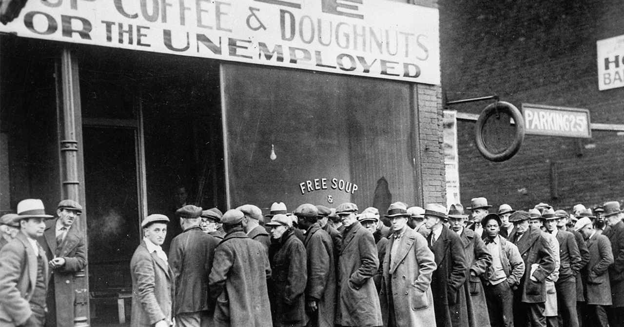 Unemployed men queued outside a depression soup kitchen in Chicago.