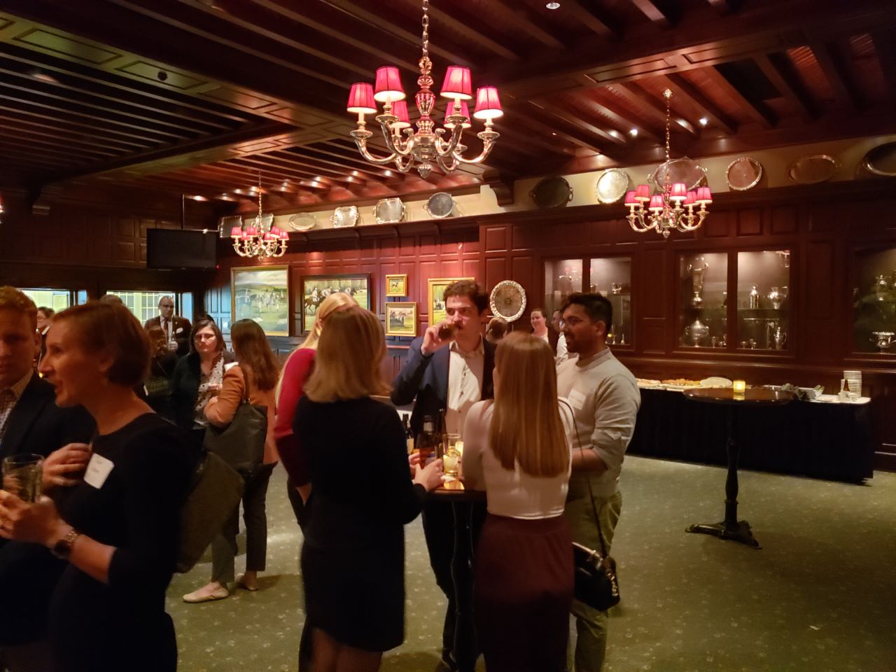 Students and alumni socialize in Clyde's of Gallery Place.
