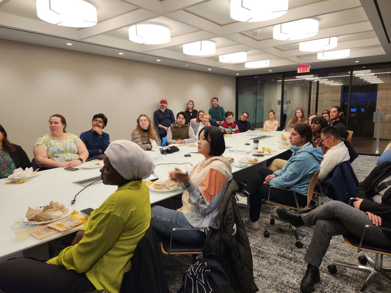 Students listen to alumni during a panel discussion.
