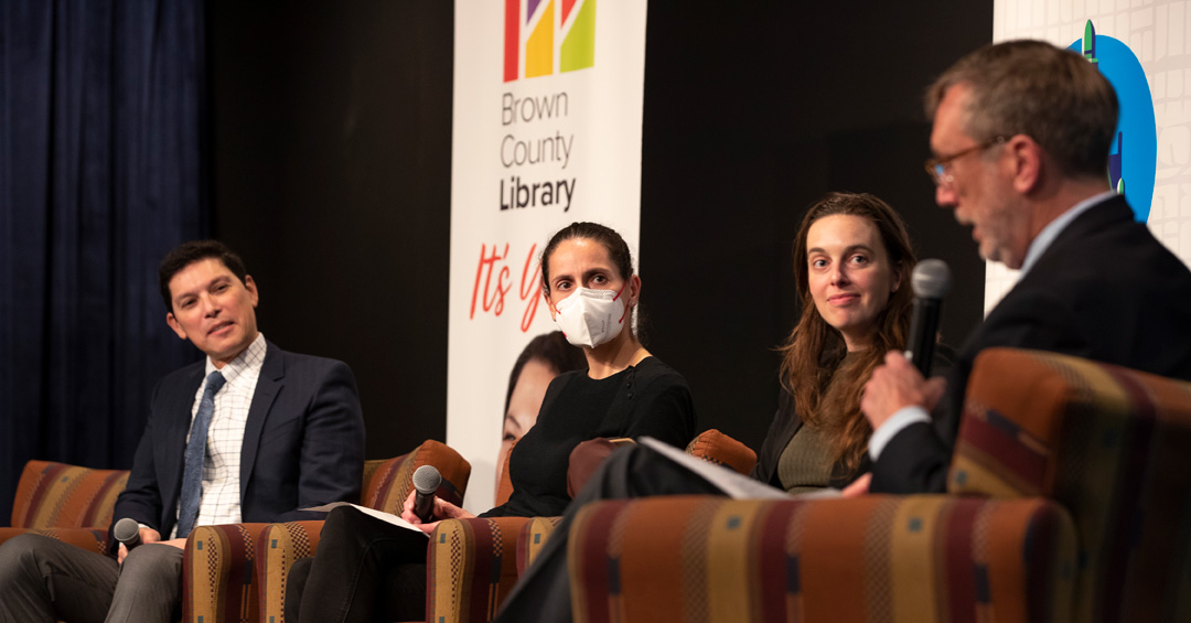 David Haynes addresses Manny Teodoro, Sarah Halpern-Meekin, and Morgan Edwards in Green Bay, WI