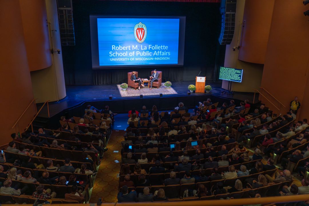 Audience members in Shannon Hall listen to the discussion between Paul Ryan and Susan Yackee