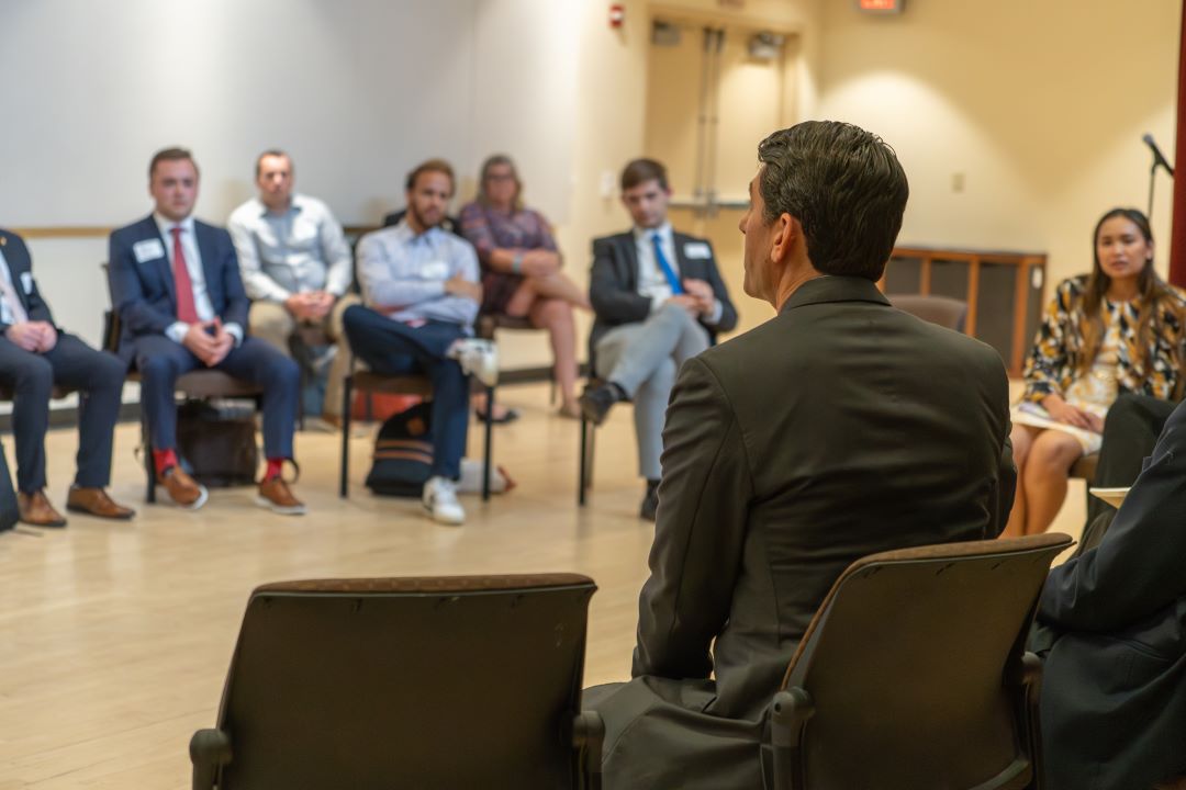 A group of students listen to Paul Ryan