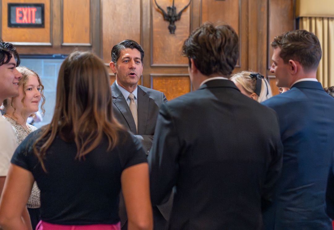 Paul Ryan chats with several people during a reception in the Memorial Union's Tripp Commons
