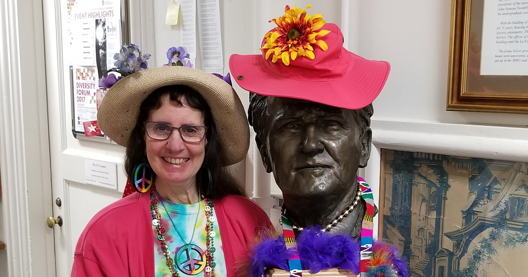 Marjorie Matthews poses with statue of Bob La Follette