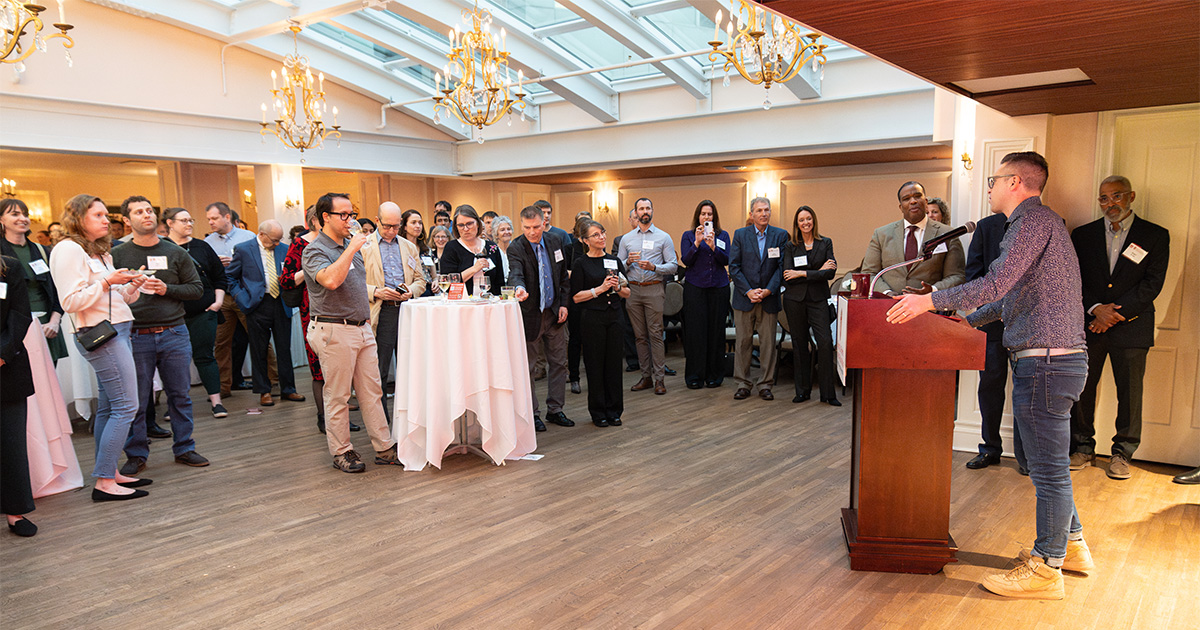 Ezra Klein addresses the La Follette community during a reception at the Madison Club