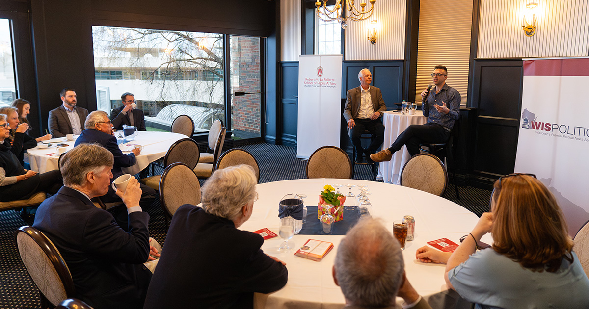 Ezra Klein answers questions from guests at the Madison Club.