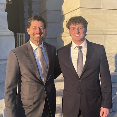 Certificate alum Joe Bachar poses for a photo with former Speaker of the House Paul Ryan