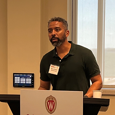 Abdel Abdellaoui speaks at podium