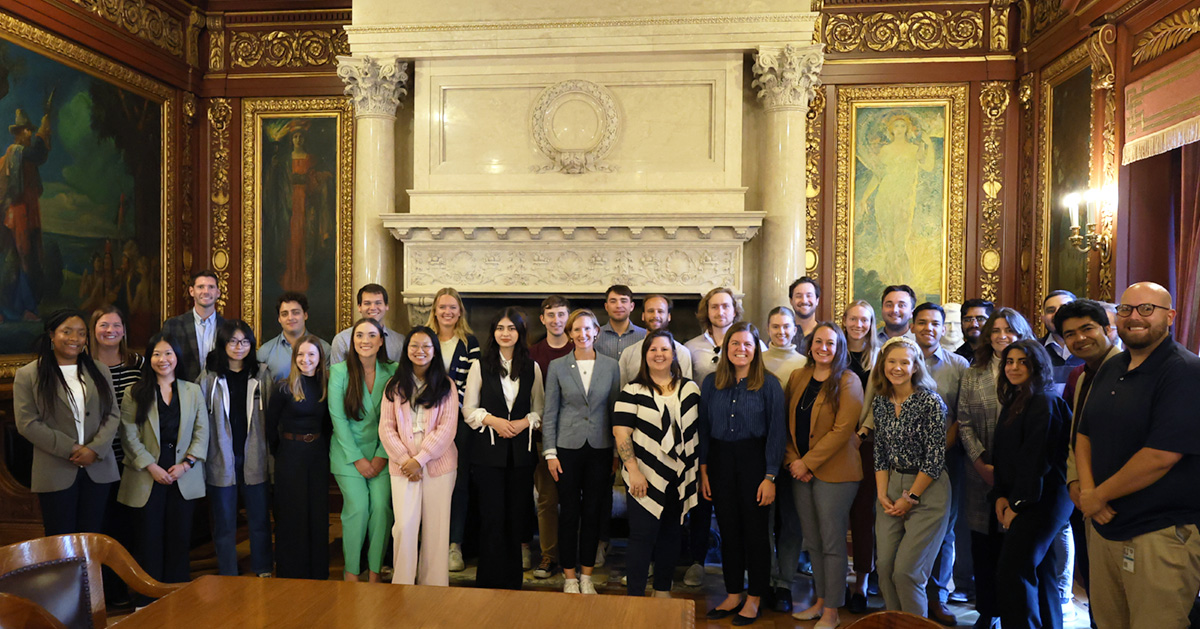 Students take a group photo with staff from the Wisconsin Governor's Office.