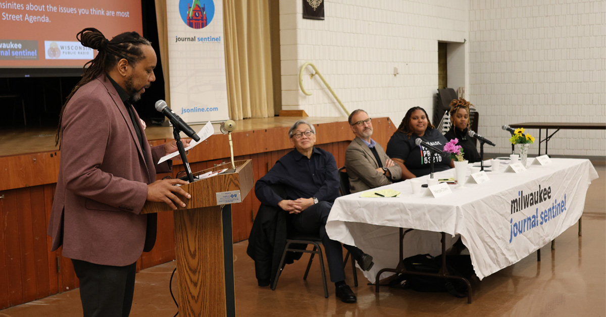James Causey introduces panelists at the Clinton Rose Senior Center in Milwaukee.
