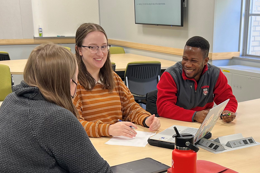 Students chat during an in-class discussion activity