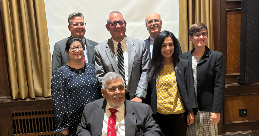 A group of Latino judges poses for a group photo.