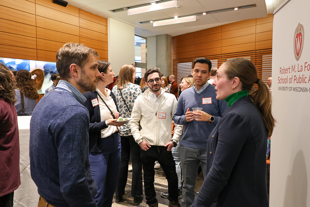 Event attendees chat during networking portion of the night