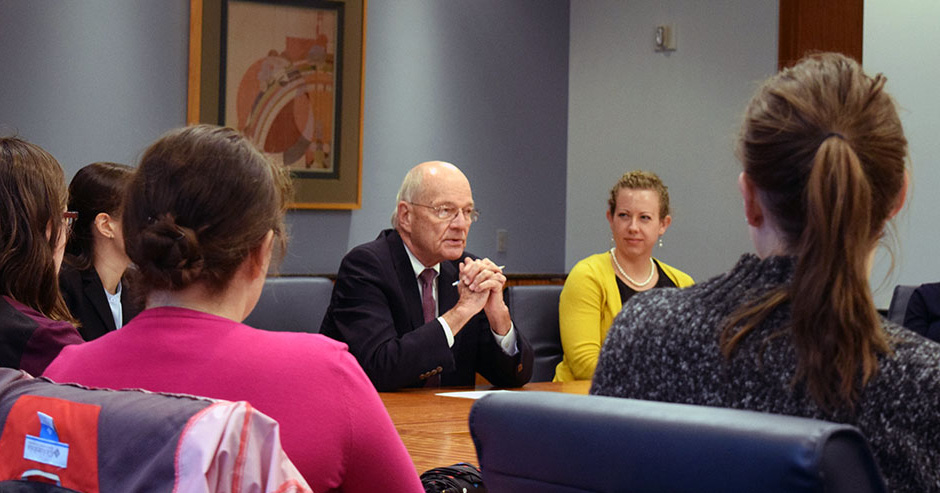 Bob Lang talks with a group of students at the Wisconsin Legislative Fiscal Bureau