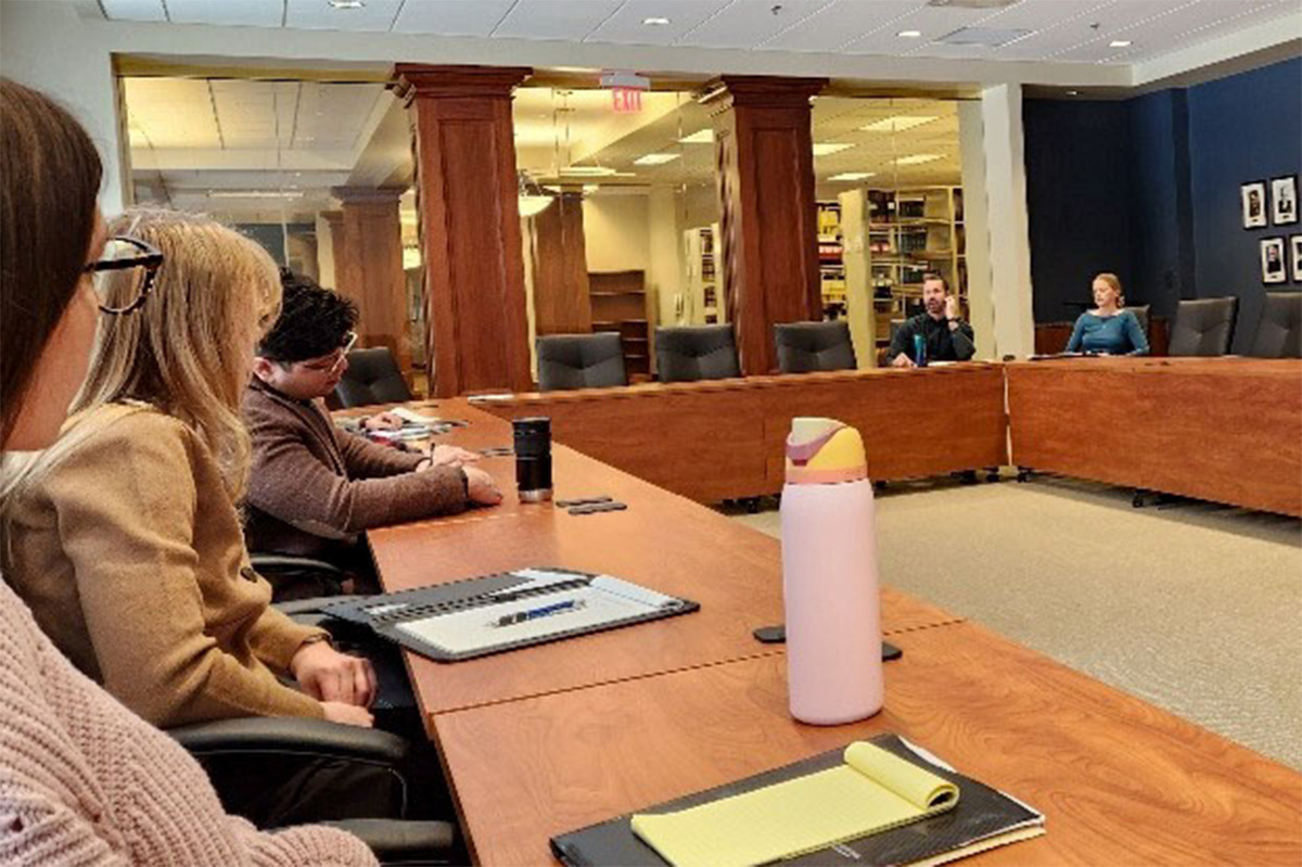 Students listen to speakers at the Wisconsin Legislative Reference Bureau