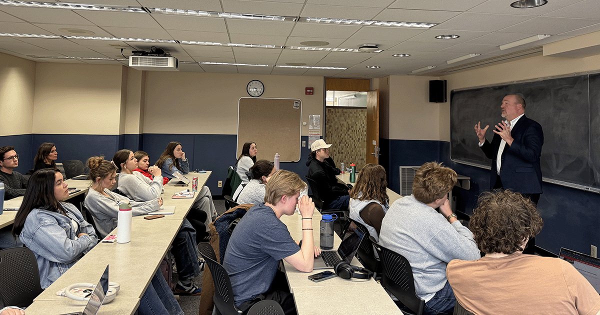 Randy Romanski speaks to clssroom