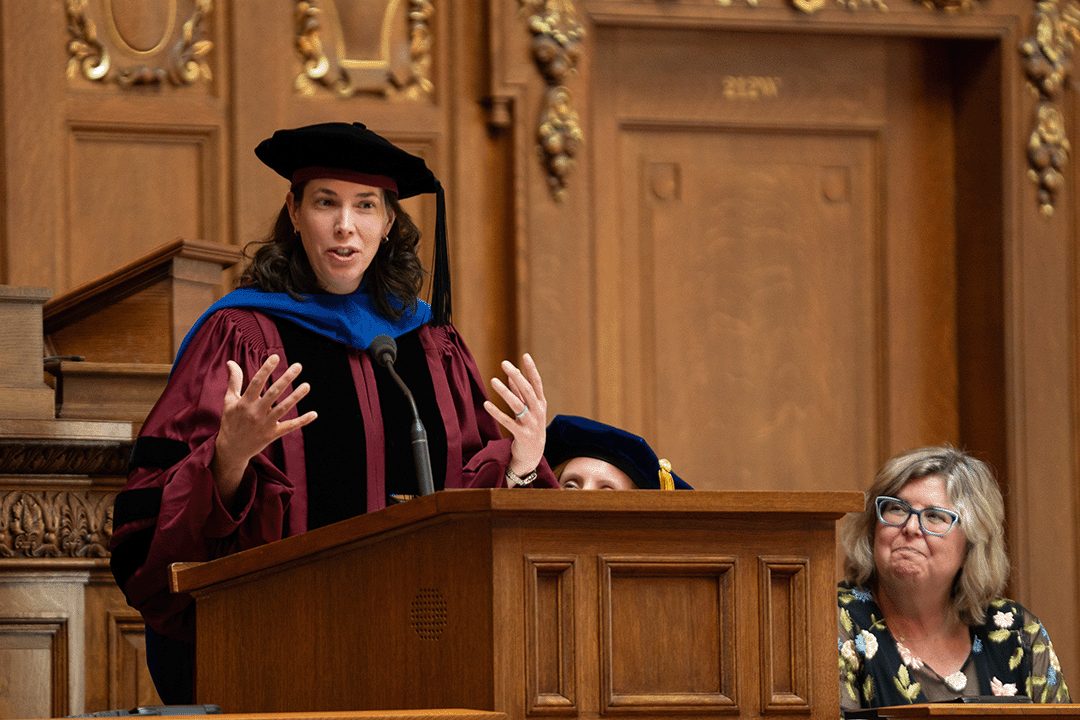 Tana Johnson addresses audience while Mo O'Connor looks on
