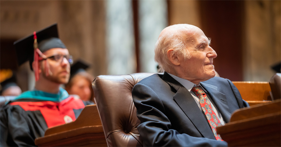 Herb Kohl sits in the Assembly Chambers of the Wisconsin State Capitol during La Follette School Graduation.