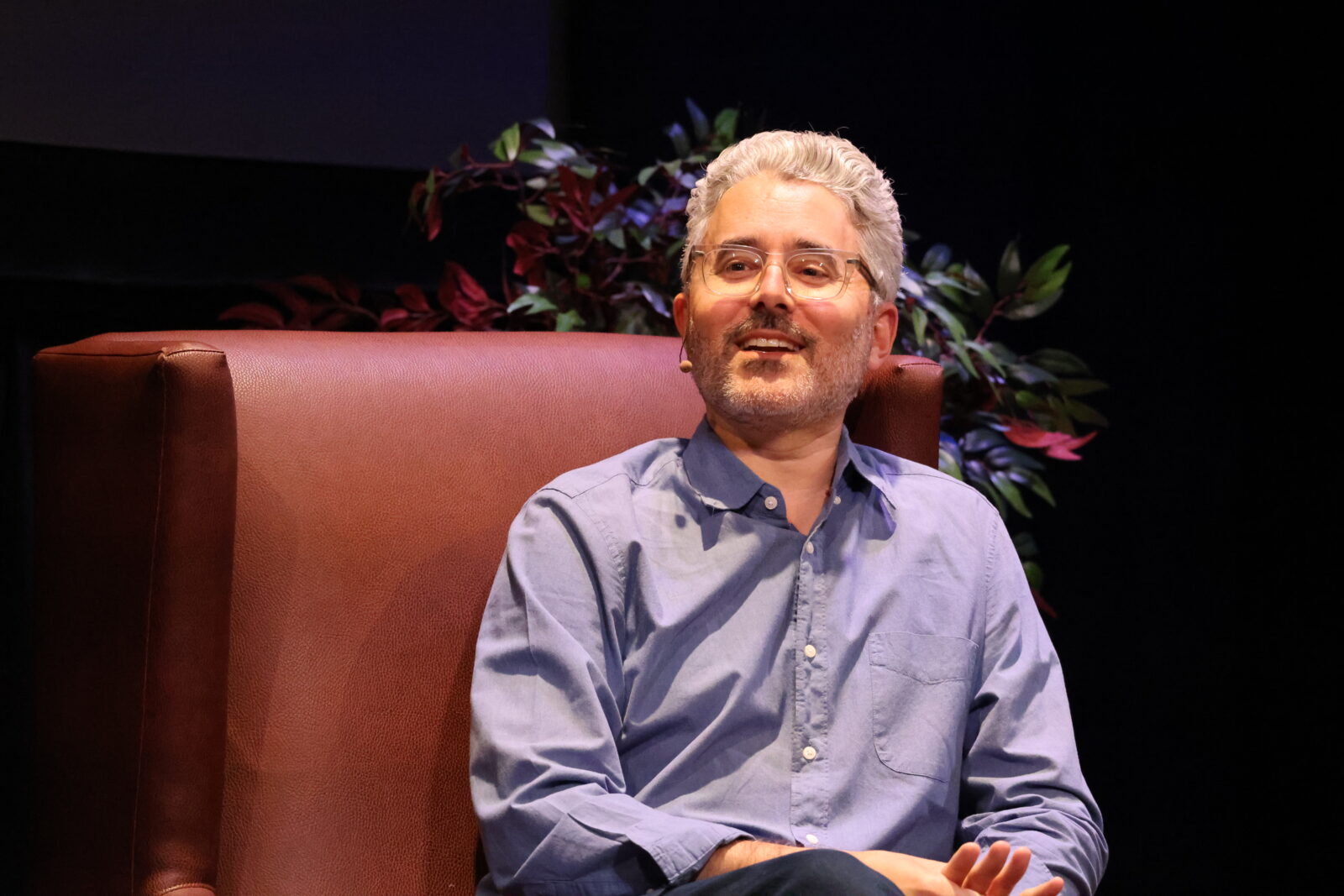 Michael Barbaro on stage at Memorial Union